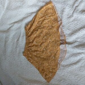 A cute lilt yellow with flowers skirt